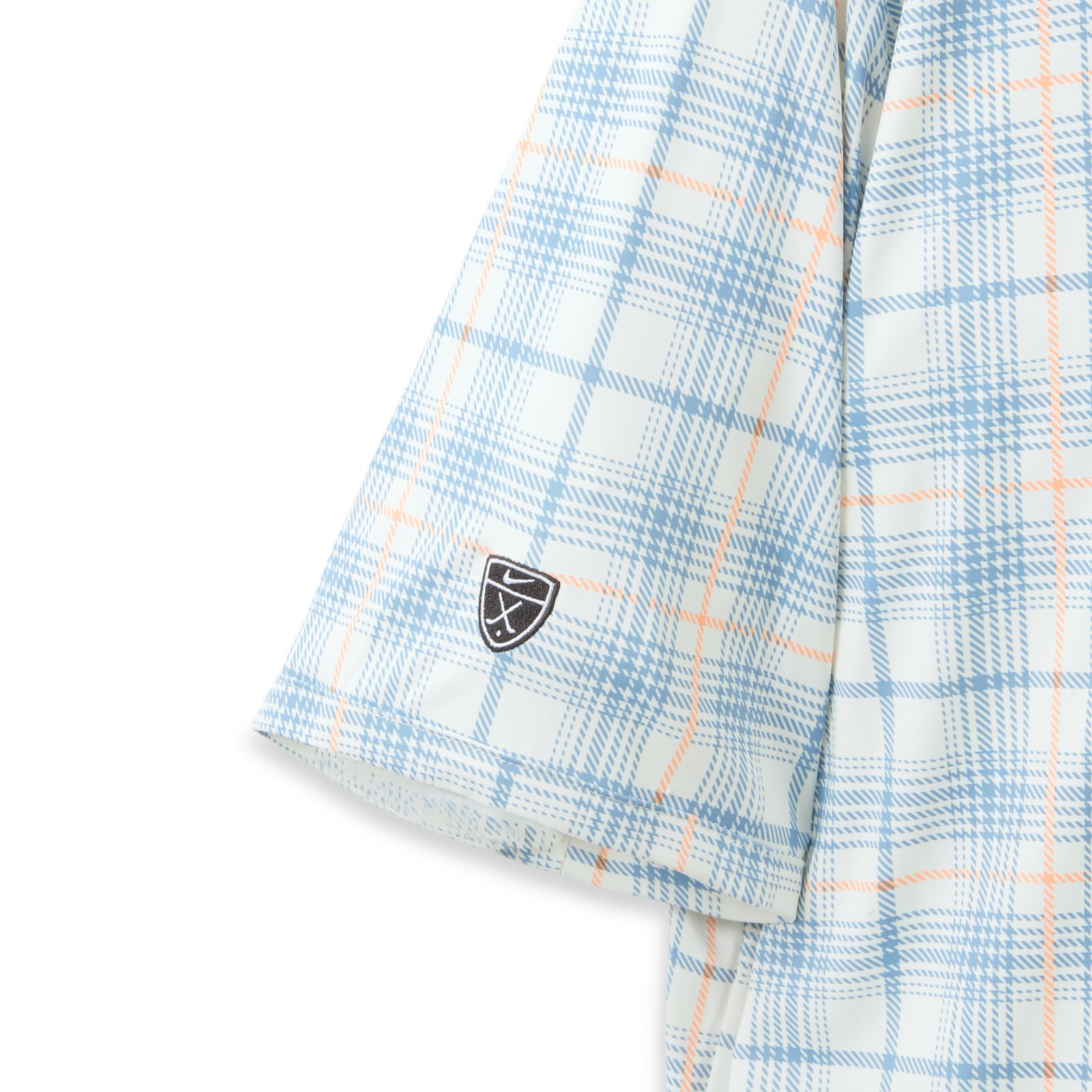 Close view of the Nike Golf sleeve shield on the Mickey polo