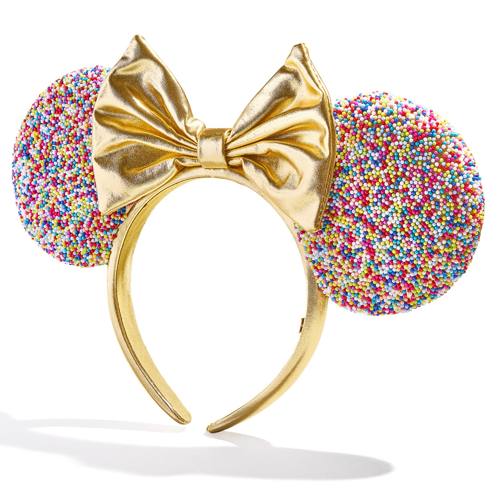 Side profile of the gold confetti Minnie Mouse ear headband