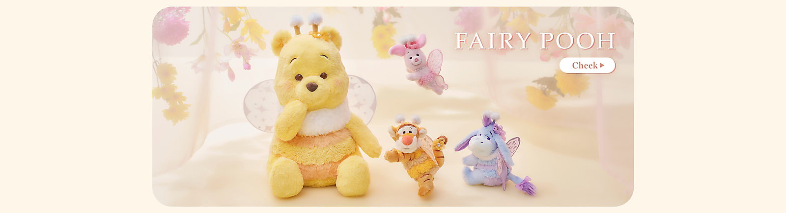 Fairy Pooh plush characters with wings and antennae in a Disney Store Japan collection banner