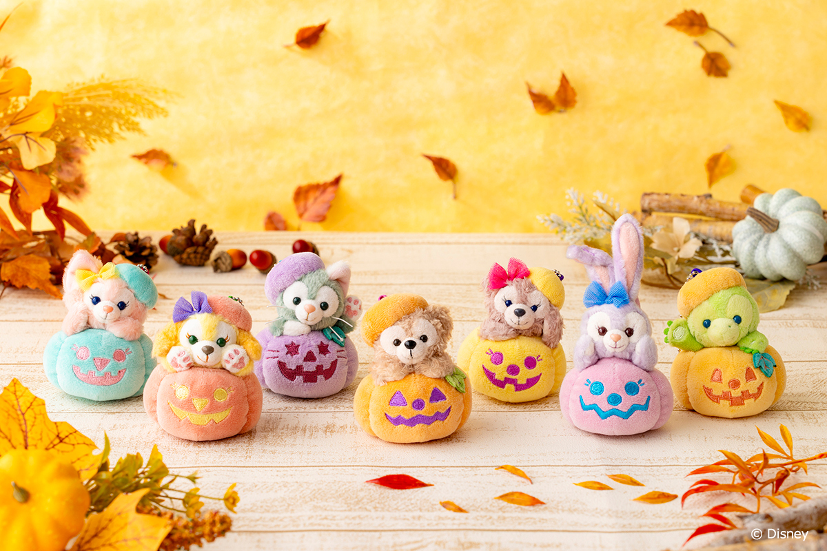 Duffy and Friends plush characters sitting in colorful Halloween pumpkins
