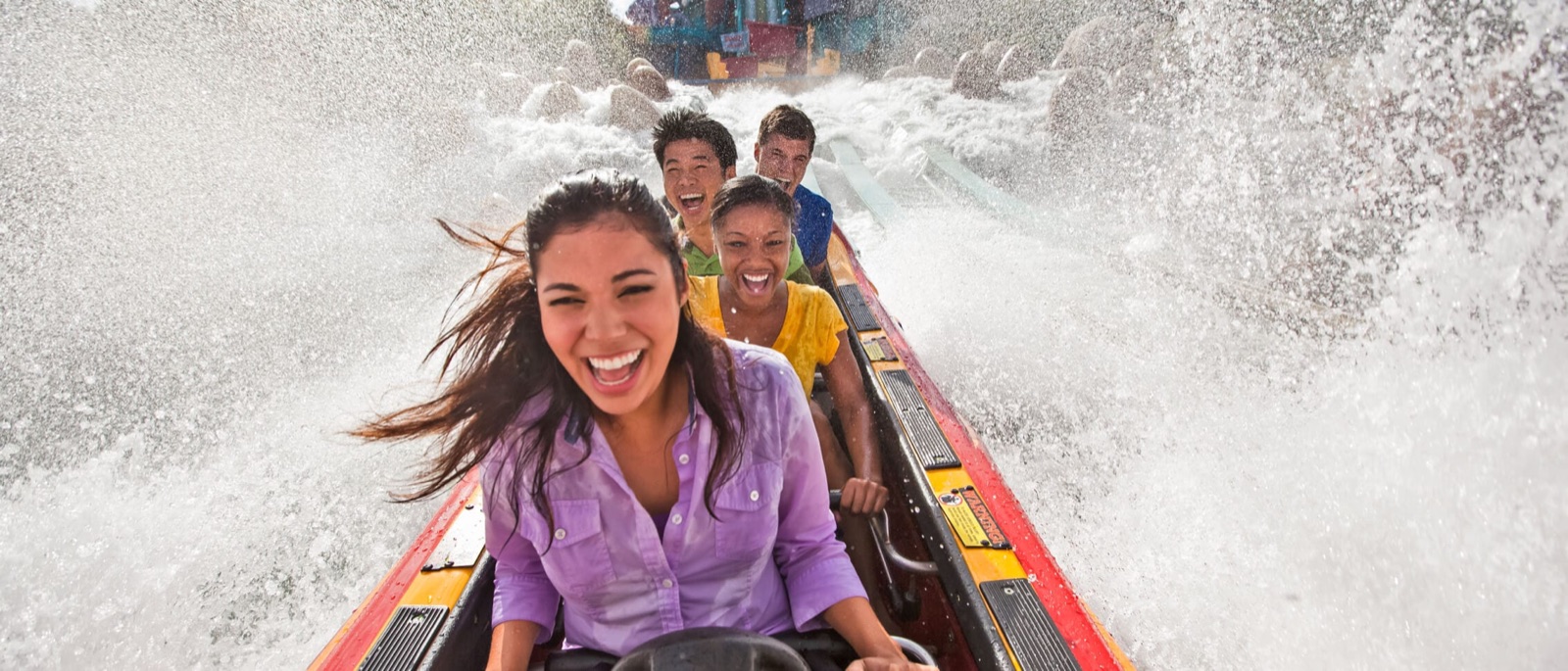 Riders splash down Dudley Do-Right's Ripsaw Falls at Islands of Adventure
