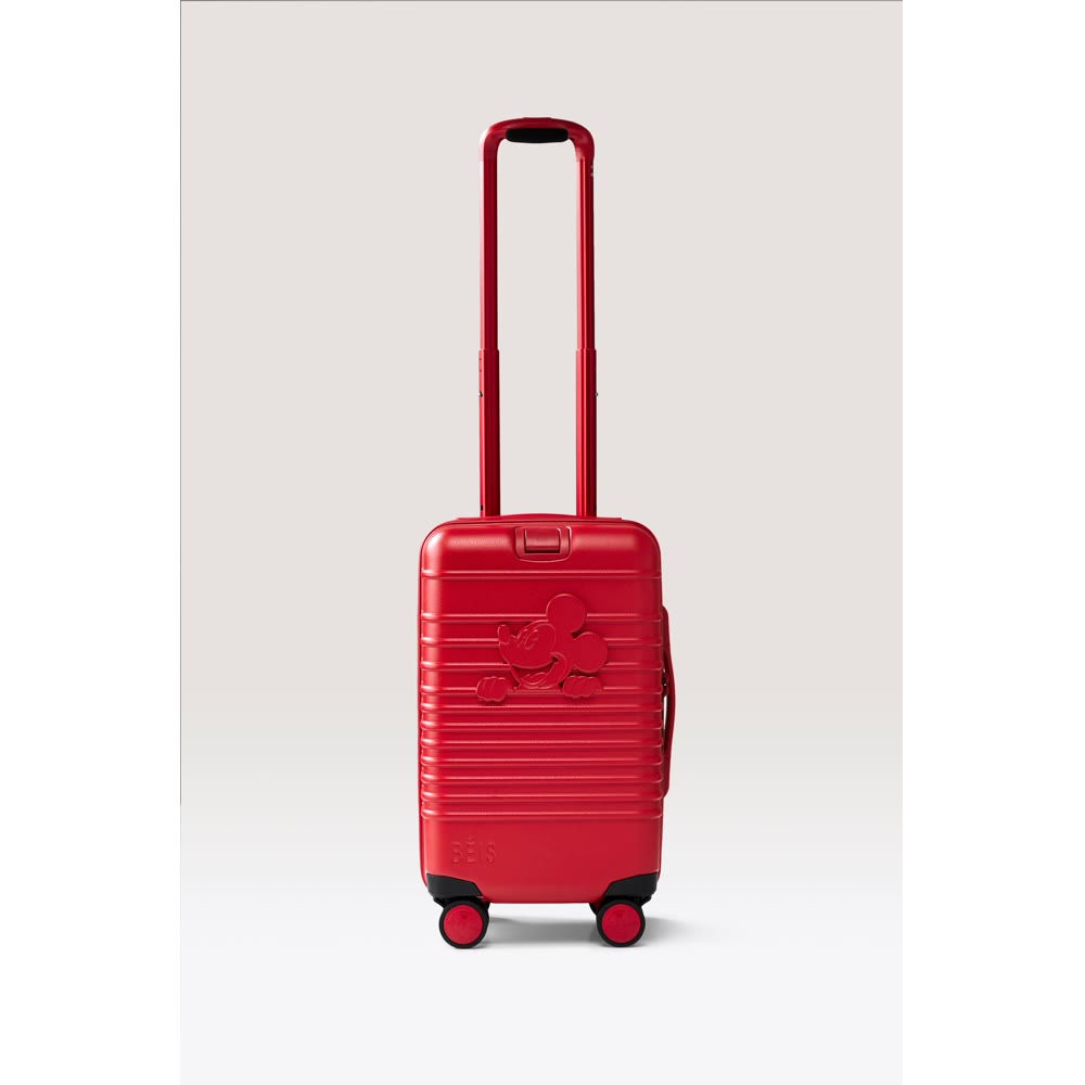 Red Mickey Mouse carry-on roller from the Disney x BÉIS travel collection