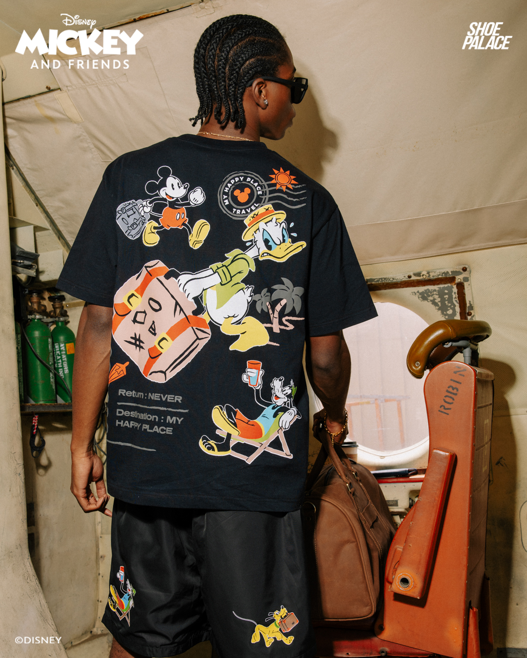 Black Mickey Mouse Traveler Collection shirt and matching shorts with travel tags and character graphics