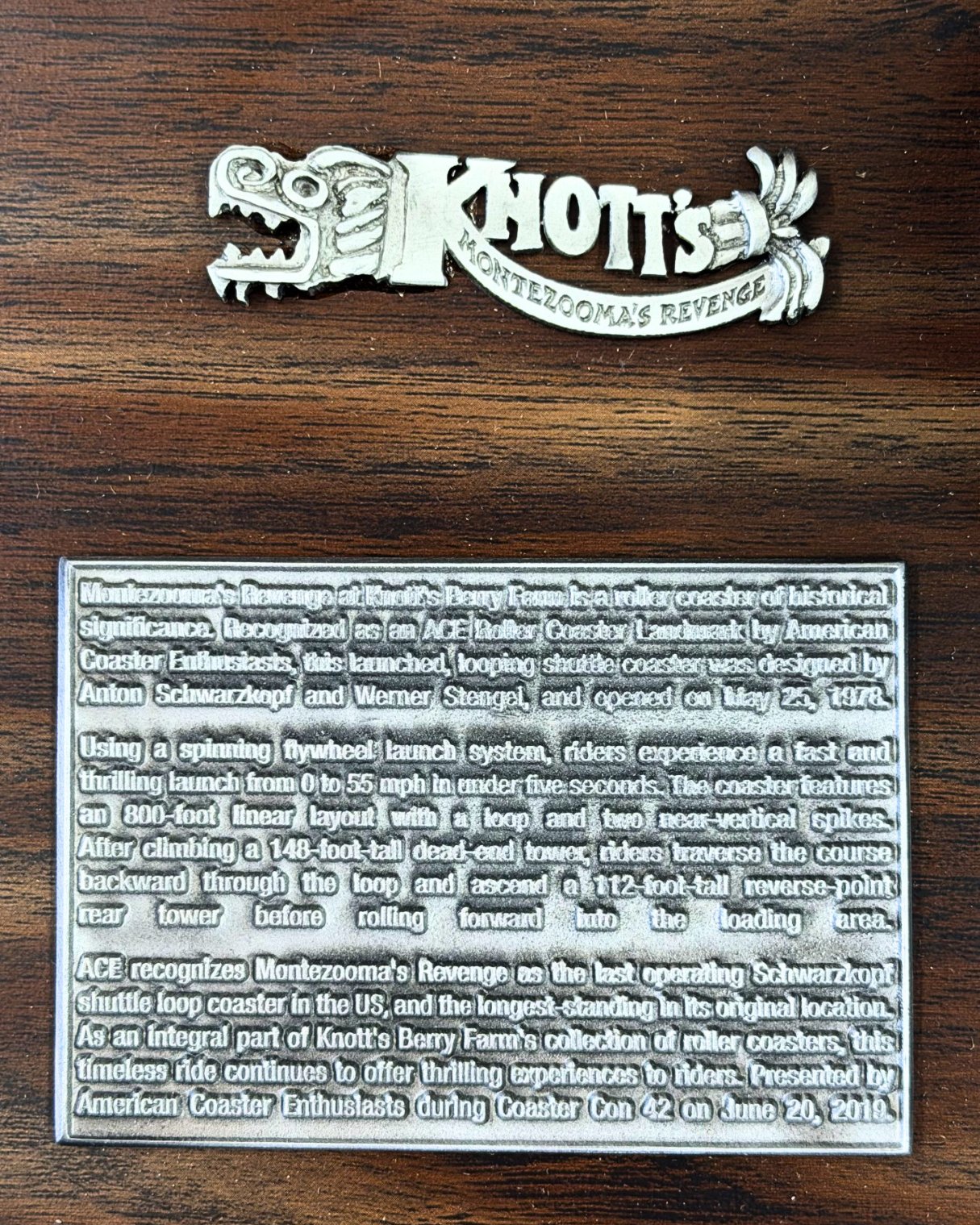 Montezooma&rsquo;s Revenge logo and Knott&rsquo;s Berry Farm history plaque