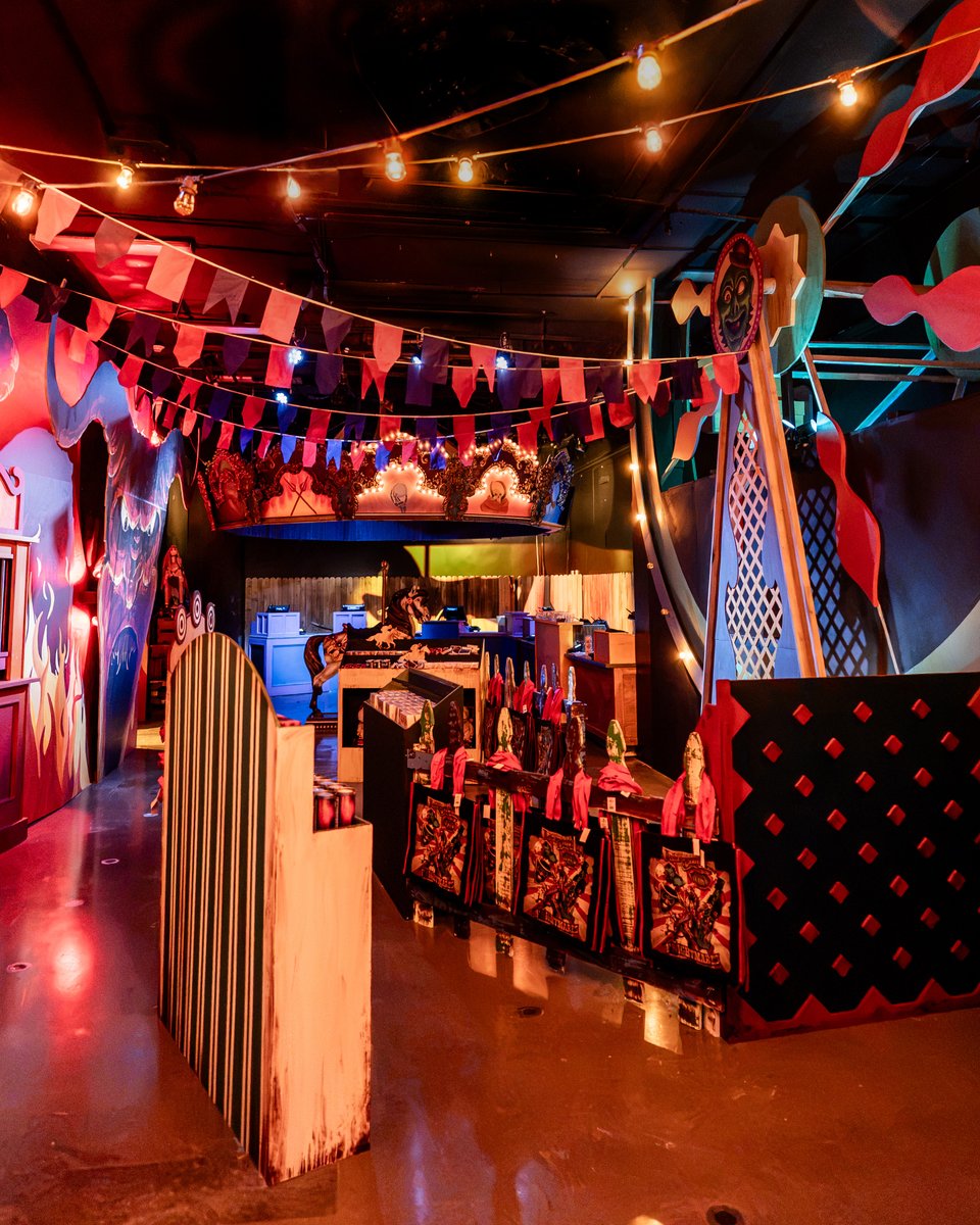 Carnival-themed retail room inside the Halloween Horror Nights 35 Tribute Store