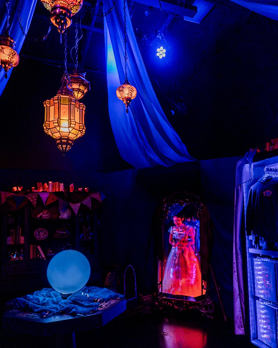 Crystal ball and mirror display inside the Halloween Horror Nights 35 Tribute Store