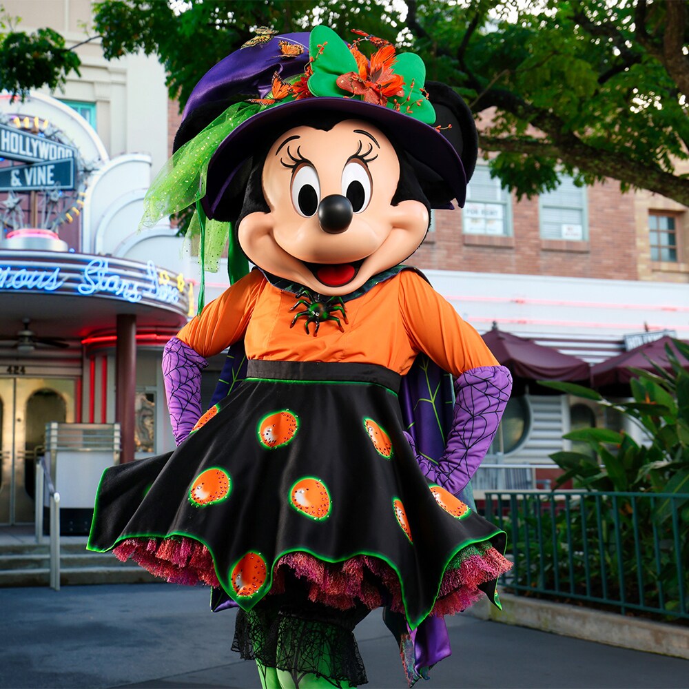 Minnie Mouse in Halloween attire outside Hollywood & Vine at Disney’s Hollywood Studios