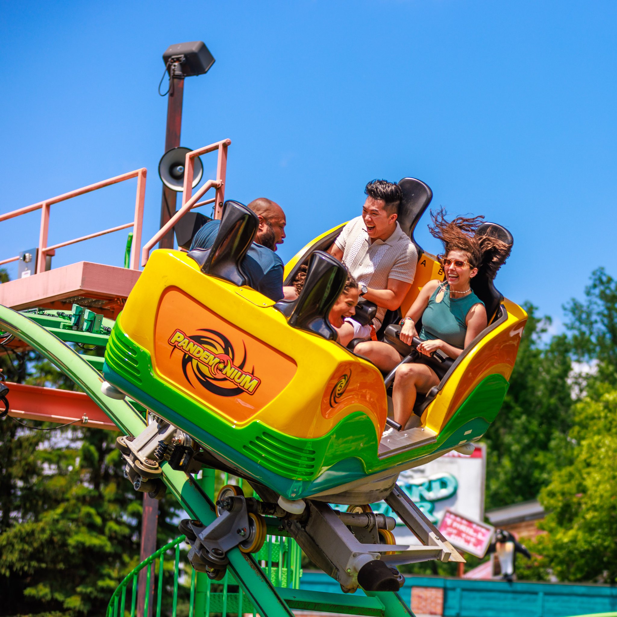 Guests riding Pandemonium at Six Flags New England