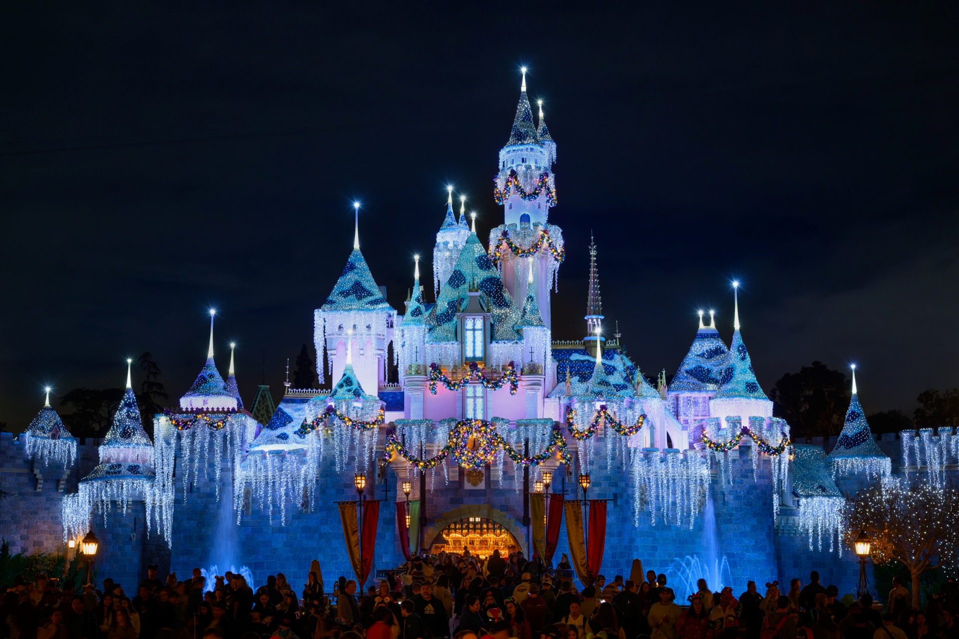 Sleeping Beauty Castle decorated for the Disneyland holiday season