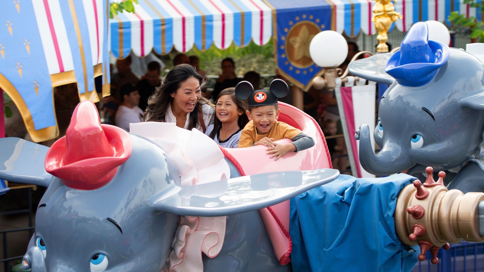 Family enjoying a ride at the Disneyland Resort
