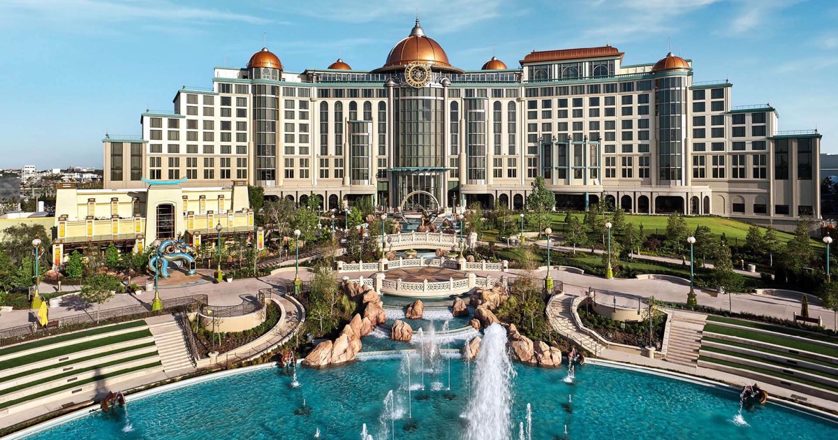 Universal Helios Grand Hotel above the gardens and fountains of Celestial Park