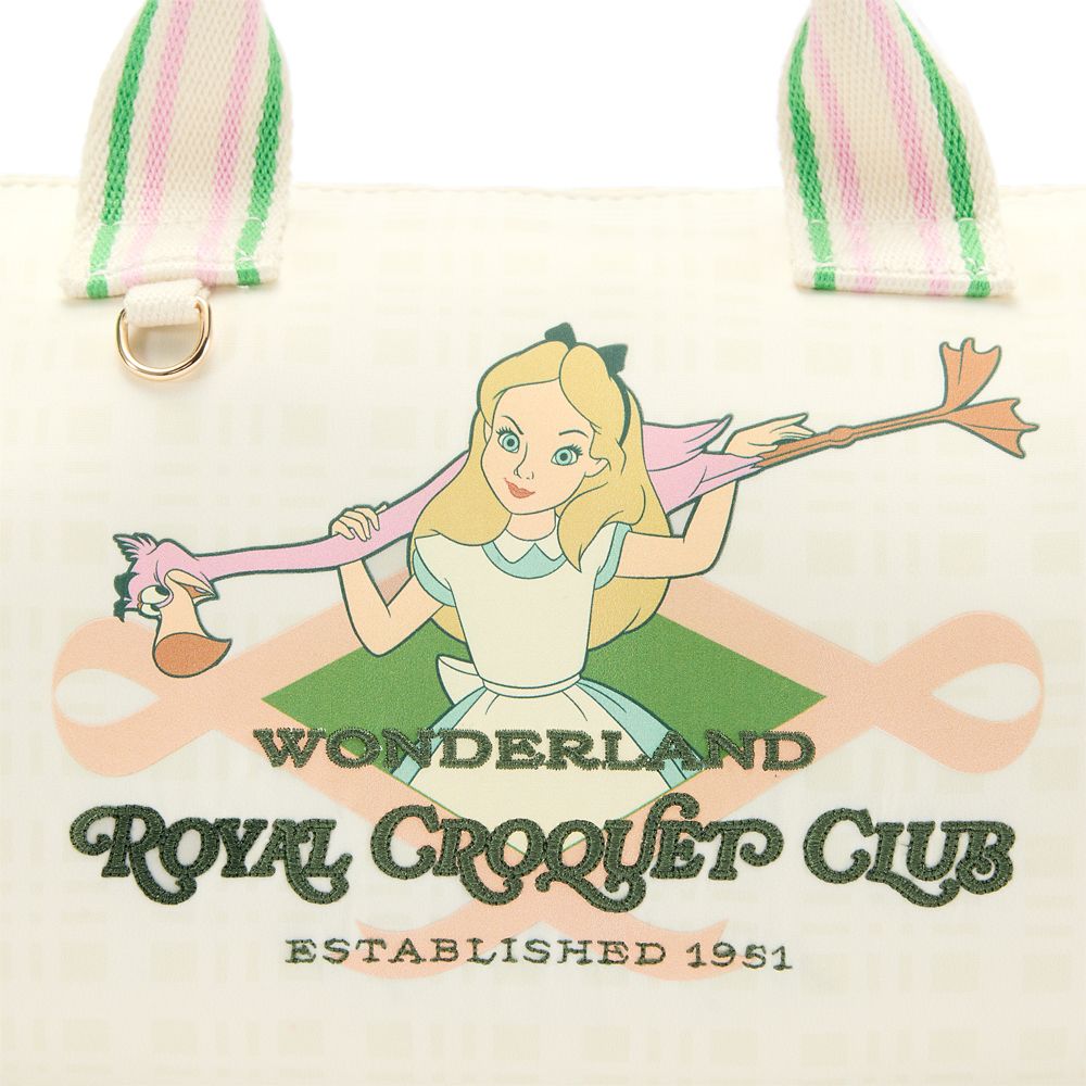 Close-up of Alice in Wonderland Royal Croquet Club artwork on the crossbody bag