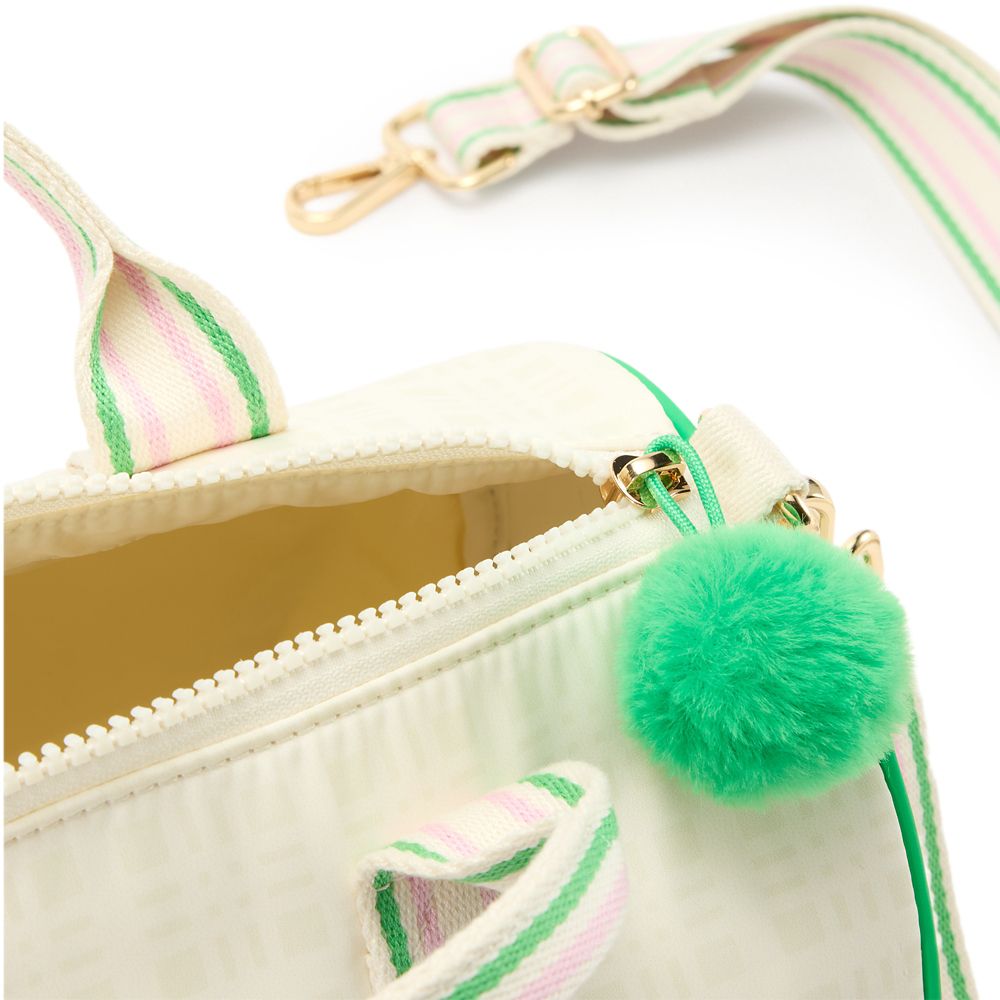 Close-up of the Alice in Wonderland crossbody bag zipper, striped strap and green pom-pom