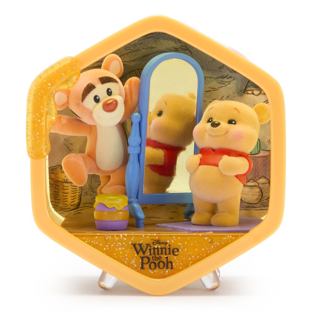 Winnie the Pooh and a friend with a mirror in a Honeycomb Homes scene