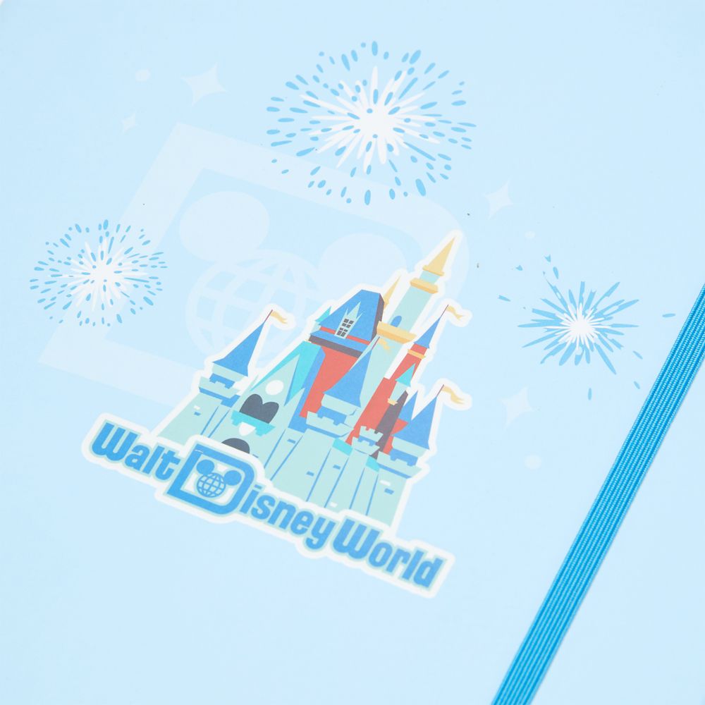 Open Walt Disney World Junk Journal showing blank pages and stickers