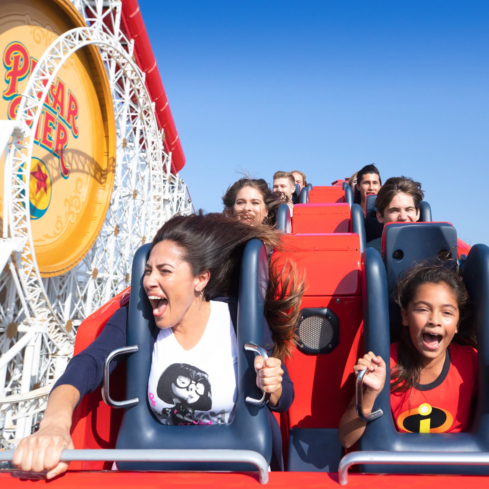 A family rides Incredicoaster at Disney California Adventure