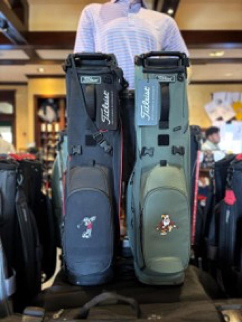 Character-inspired Players S4 Titleist golf bags at a Walt Disney World Golf shop
