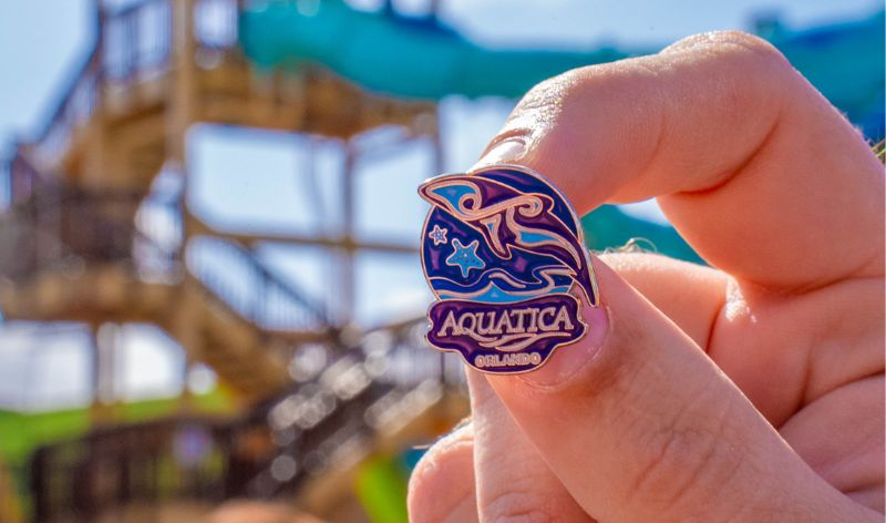 Aquatica Orlando Friends and Family Night promotion with a dolphin pin