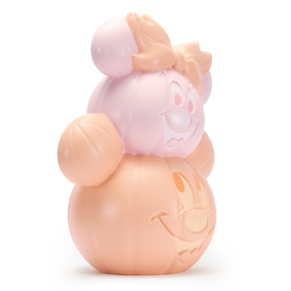 Side view of Mickey and Minnie pastel jack-o'-lantern decor