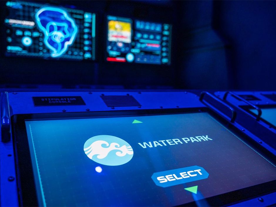 A screen showing the words Water Park inside Jurassic World: Escape