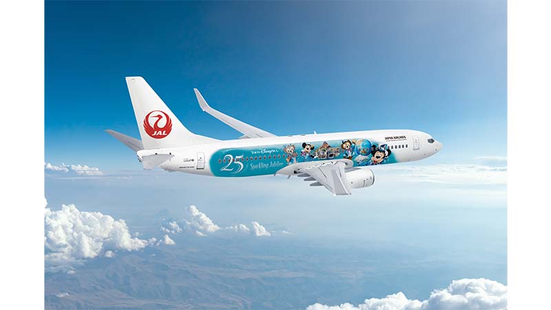 JAL Jubilee Express Boeing 737-800 in Tokyo DisneySea 25th anniversary livery flying above clouds