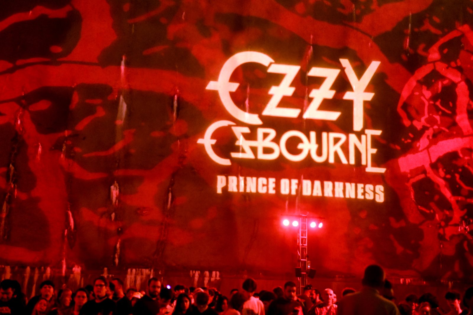 Ozzy Osbourne lettering under red lights