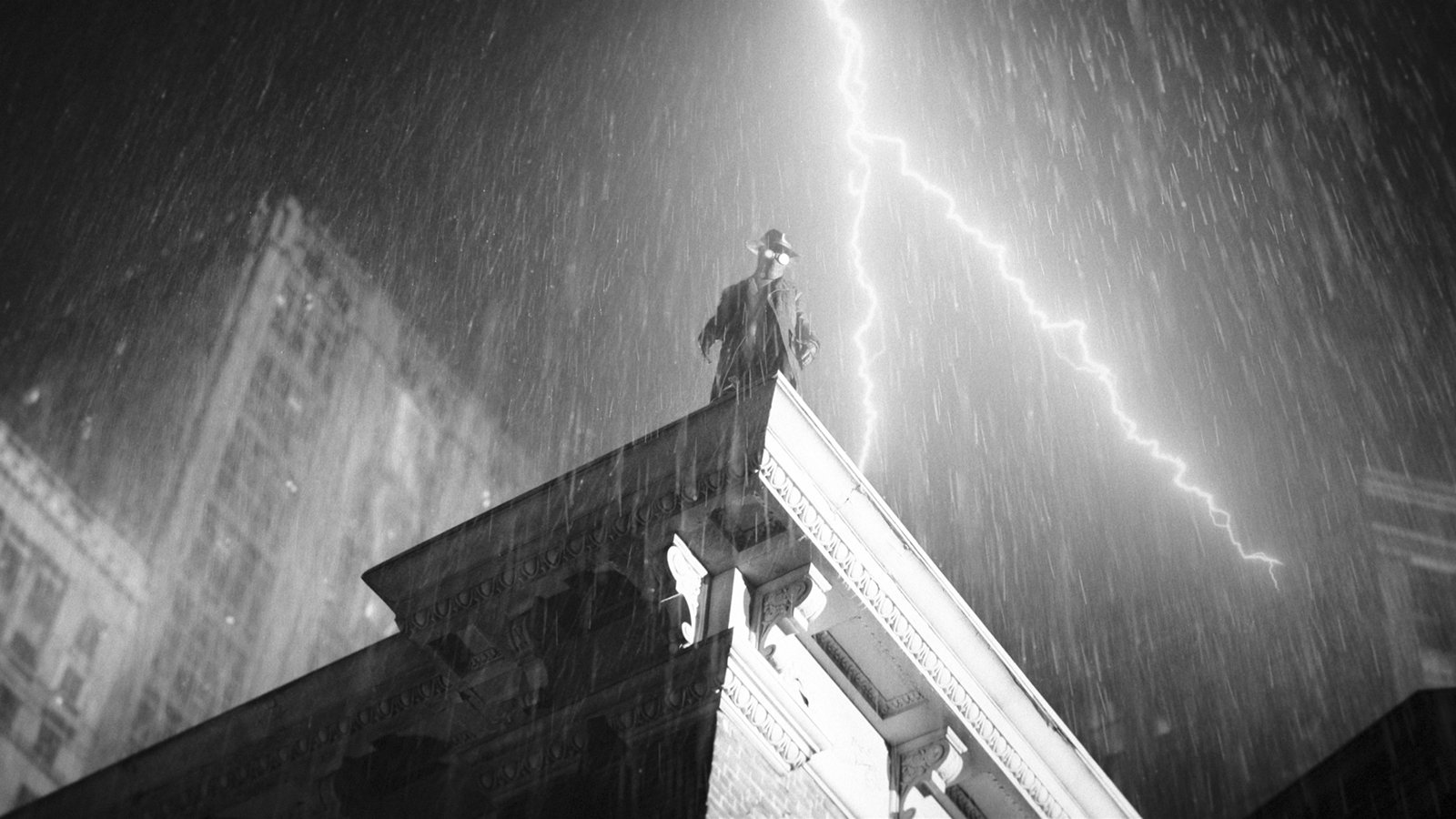 Nicolas Cage as The Spider on a rooftop in Spider-Noir
