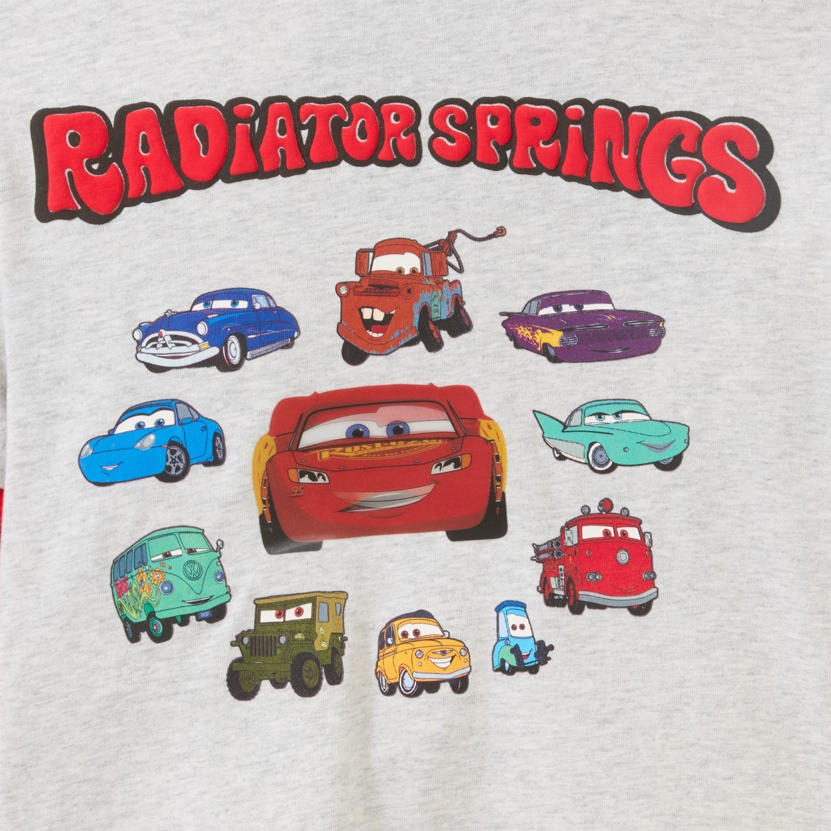 Radiator Springs character artwork on the tee