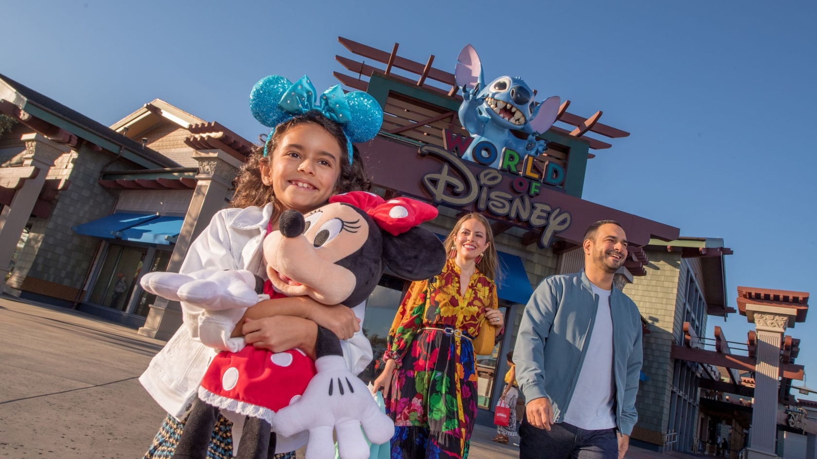 Guests outside World of Disney at Disney Springs