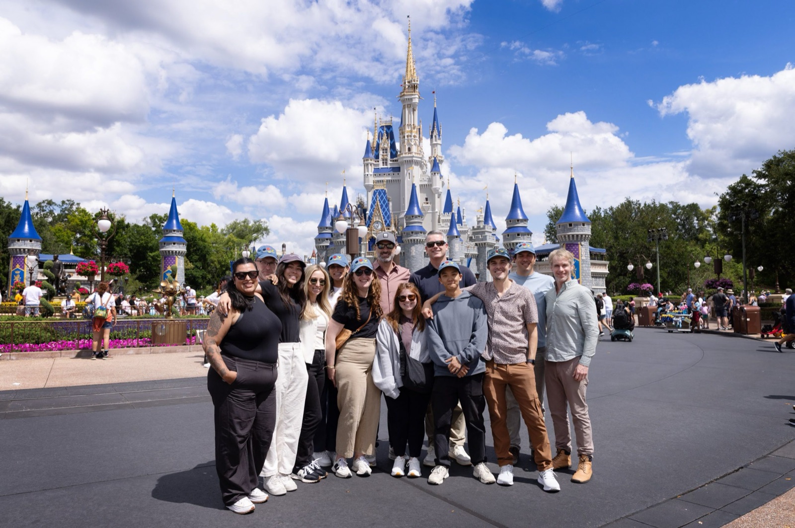 A group stands in front of Cinderella Castle in an official image accompanying Disney's Sounds of Disney article.