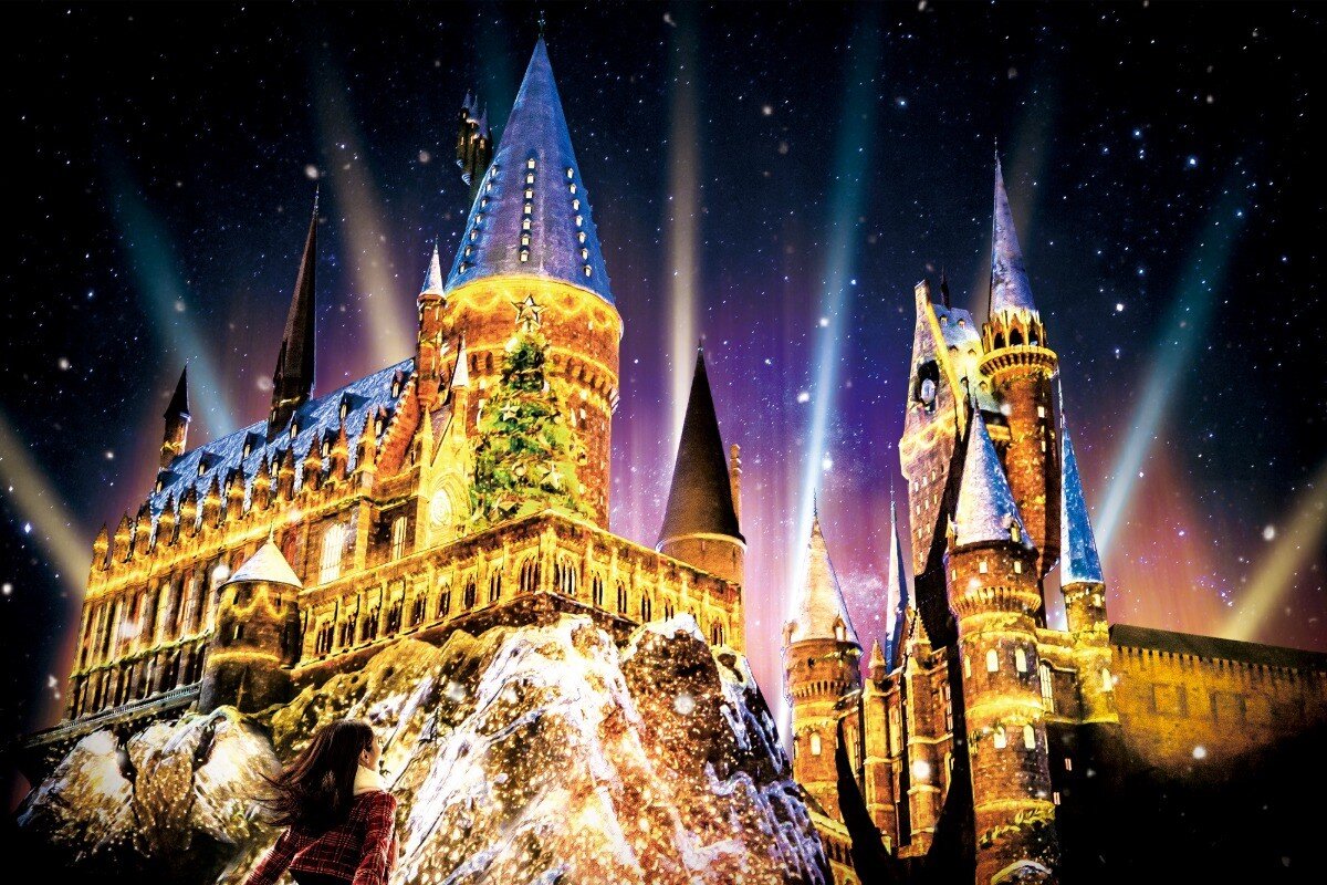 Hogwarts Castle illuminated with colorful winter projection mapping at Universal Studios Japan