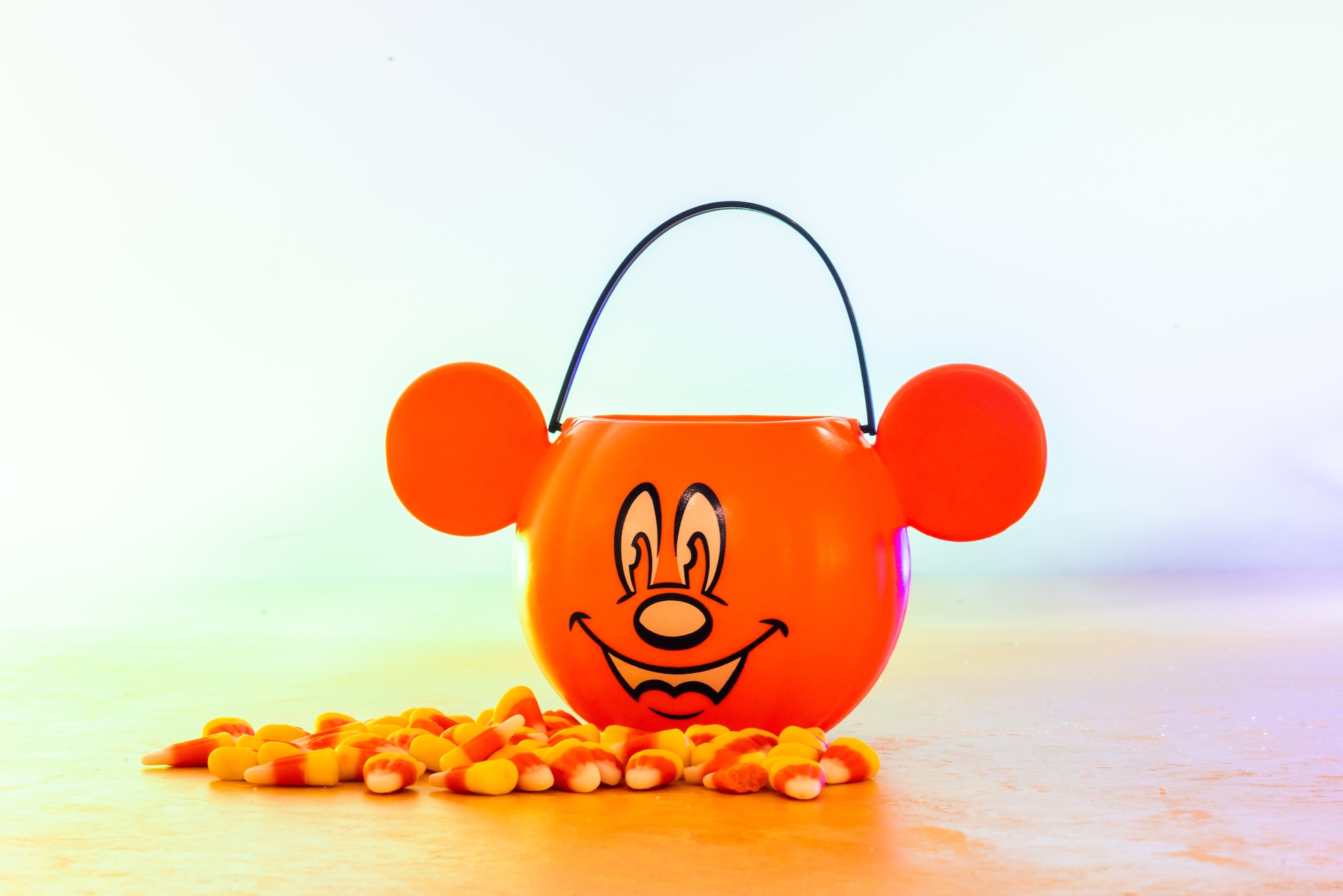 Pumpkin Mickey Mouse with Candy Corn in Disney’s official Halloween product photography