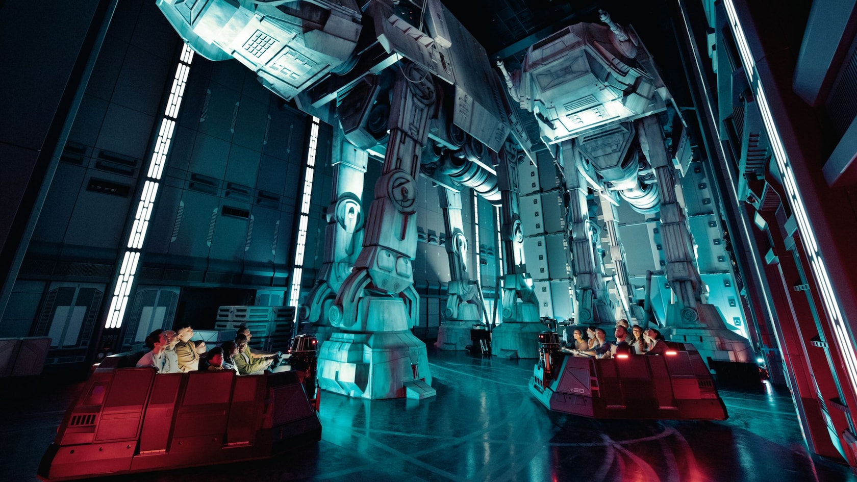 Guests ride beneath AT-AT walkers inside Star Wars: Rise of the Resistance at Disneyland