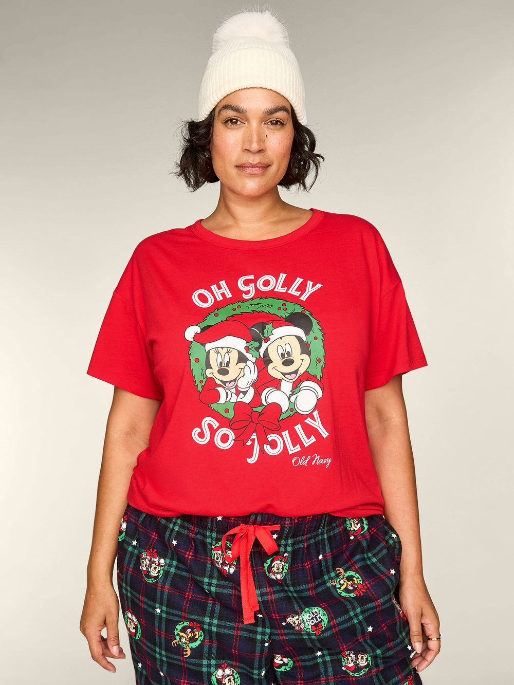 Model wearing the red Mickey and Minnie holiday wreath T-shirt