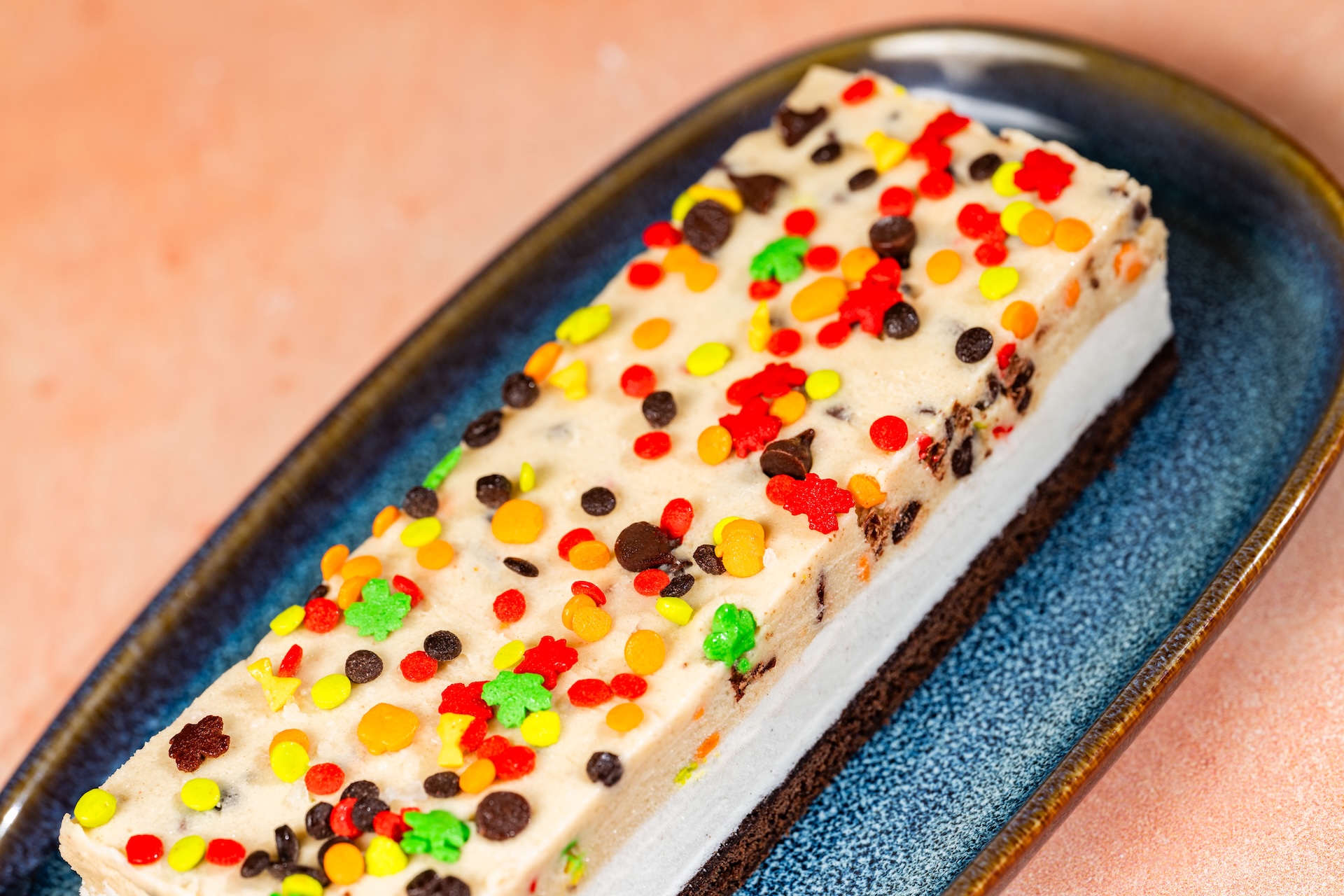 Fall Ice Cream Cookie Dough Sandwich with vanilla ice cream, cookie dough, brownie, chocolate chips and fall sprinkles