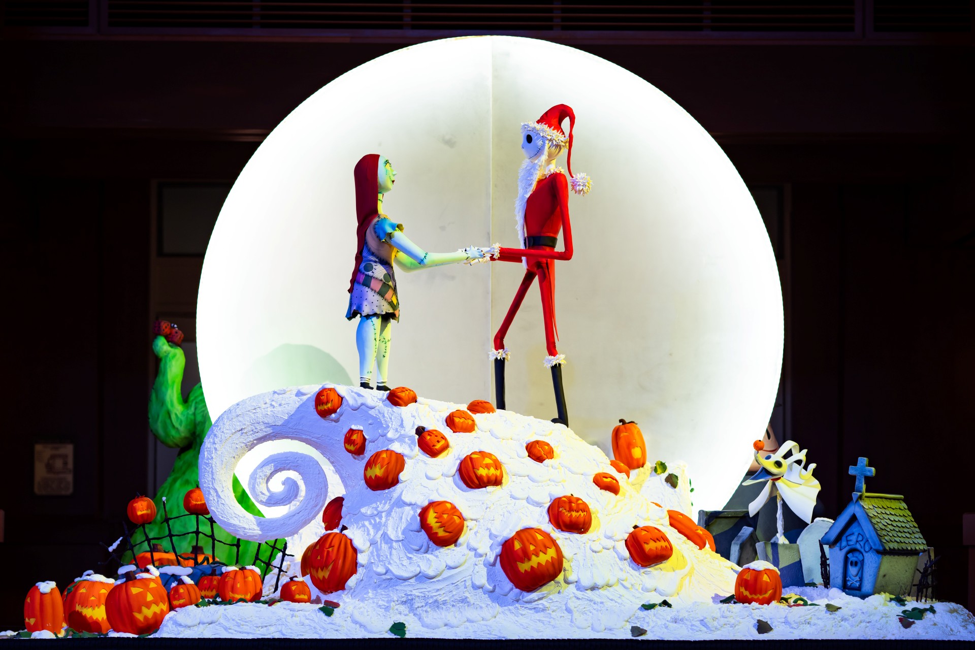 Jack Skellington and Sally stand atop the Grand Californian Nightmare Before Christmas confection
