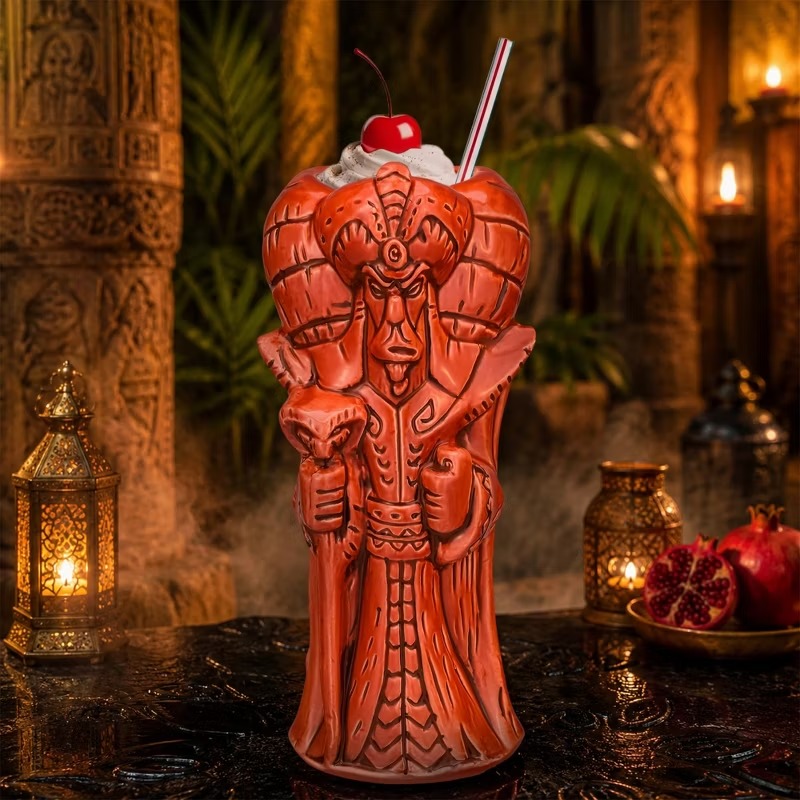 Jafar Geeki Tikis mug on a table with lanterns