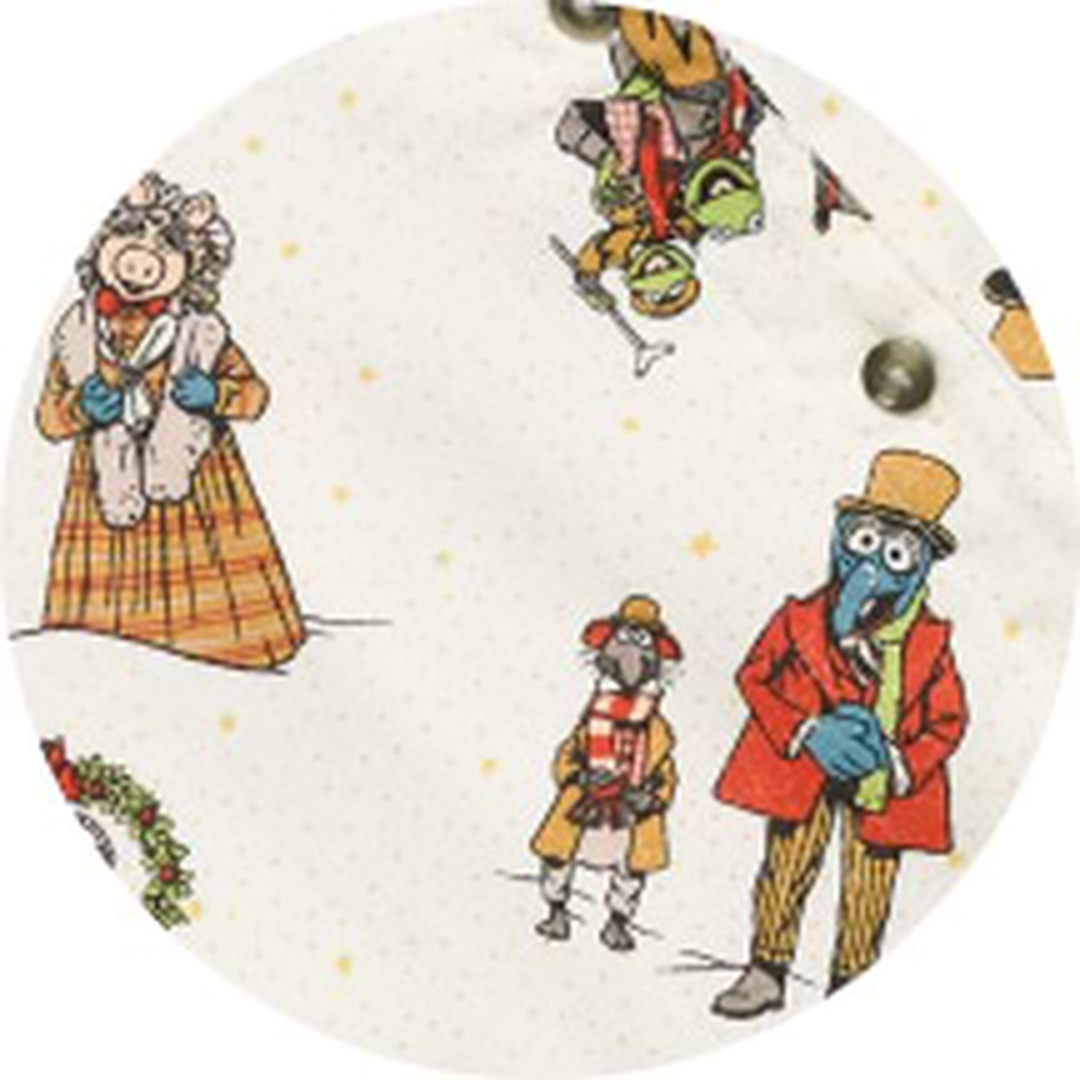 A cream Old Navy holiday print with Muppets characters in Victorian clothing