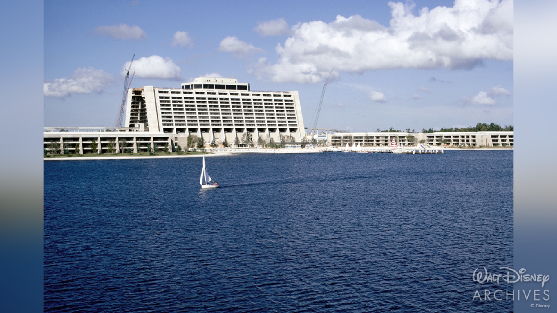 Disney’s Contemporary Resort rises over Bay Lake in November 1971