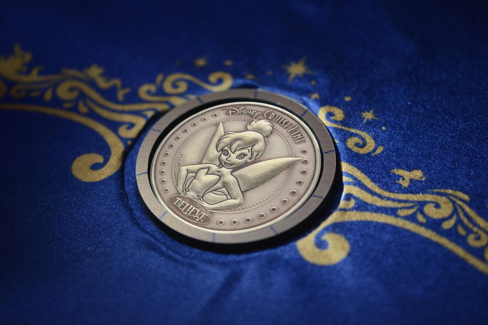 Tinker Bell coin used for the Disney Believe keel-laying ceremony