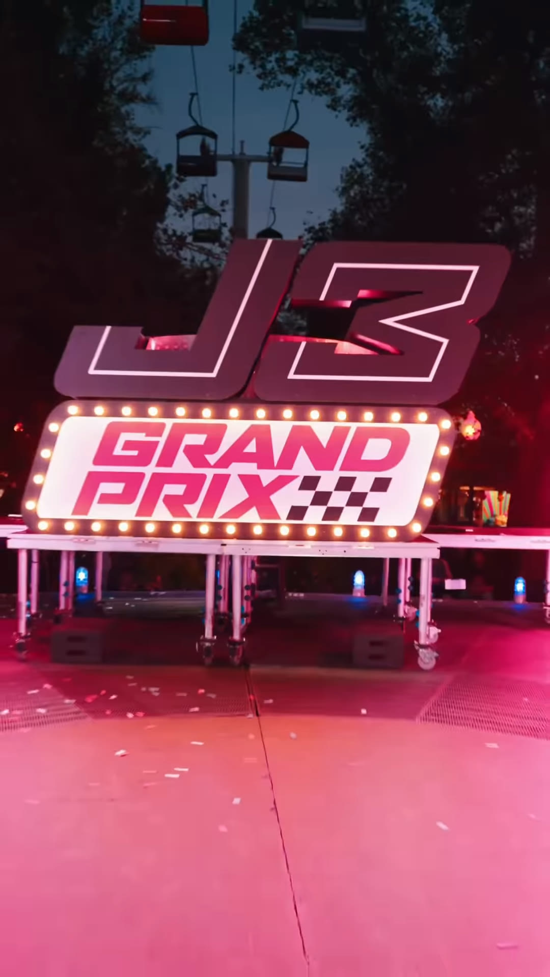 J3 Grand Prix illuminated onstage during Lagoon's coaster reveal