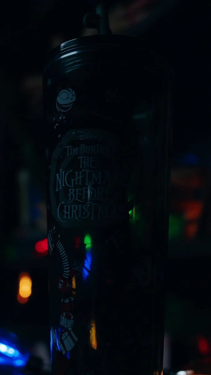 Green Nightmare Before Christmas Starbucks tumbler shown in Disney Store’s official launch video