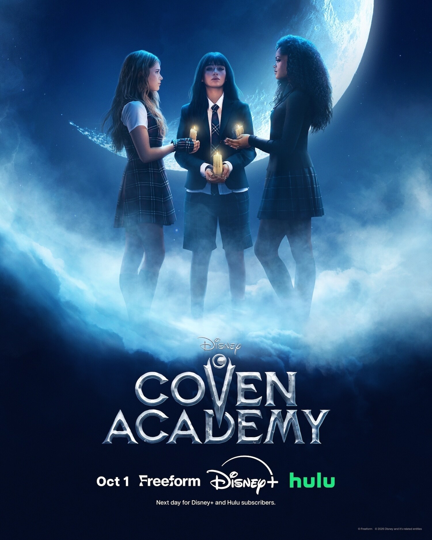 Briar, Tegan and Sasha stand beneath a full moon with candles
