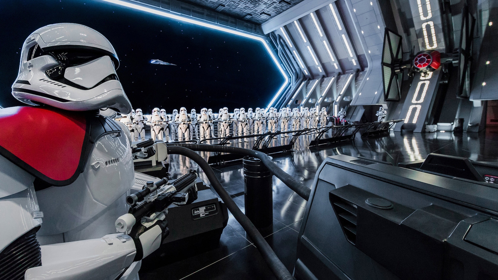 Resistance fighters face First Order stormtroopers inside Star Wars: Rise of the Resistance