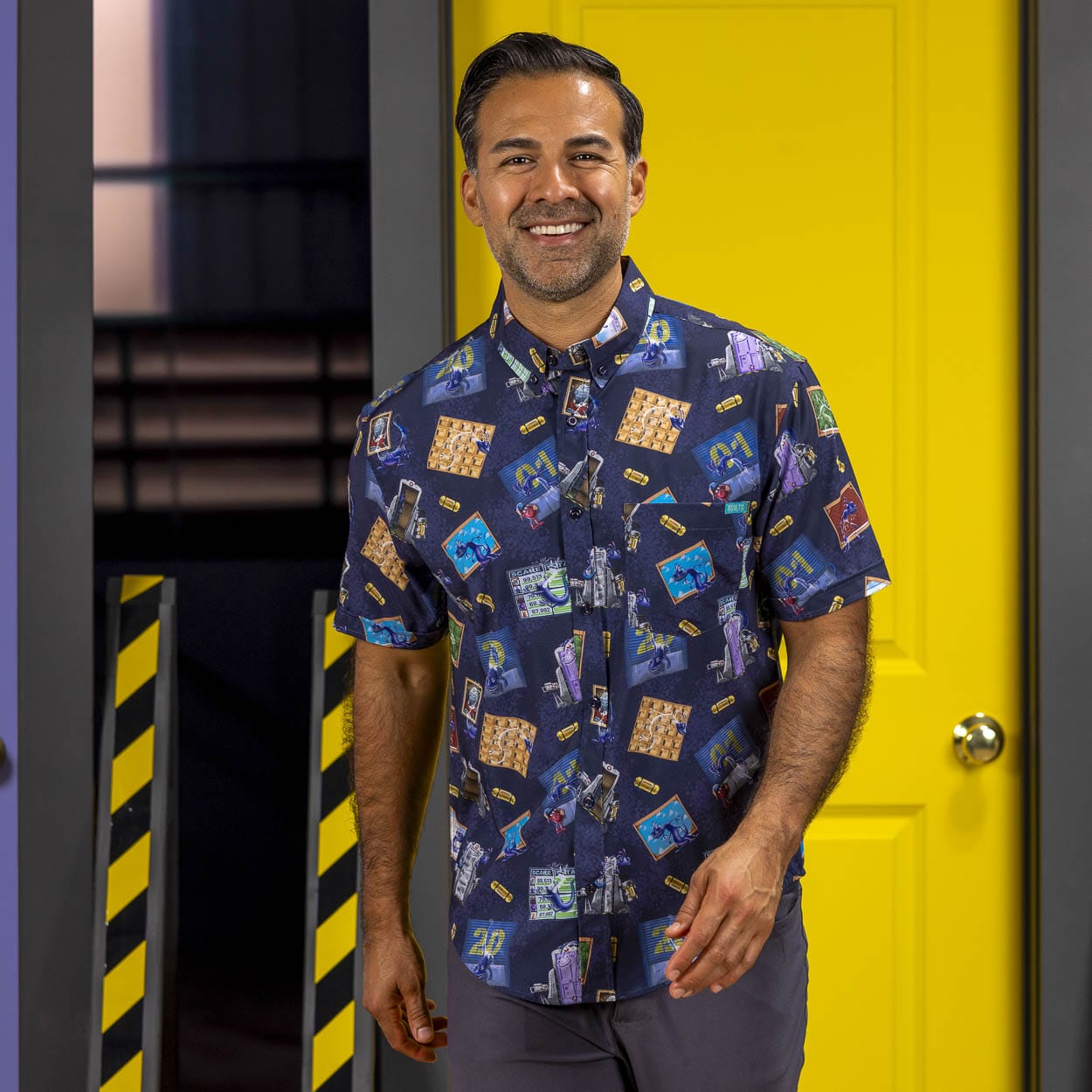 Model wearing the navy RSVLTS Monsters, Inc. Stealth Mode Randall shirt