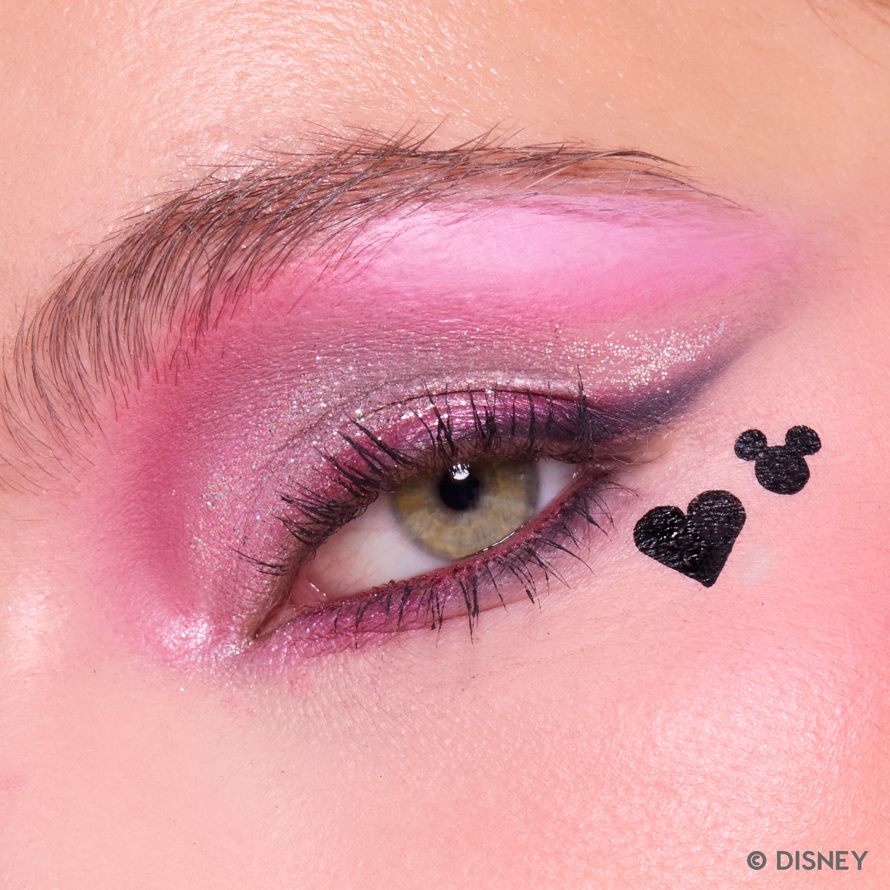Close-up of the Mickey silhouette and heart from the Merry Mickey Face Stamp