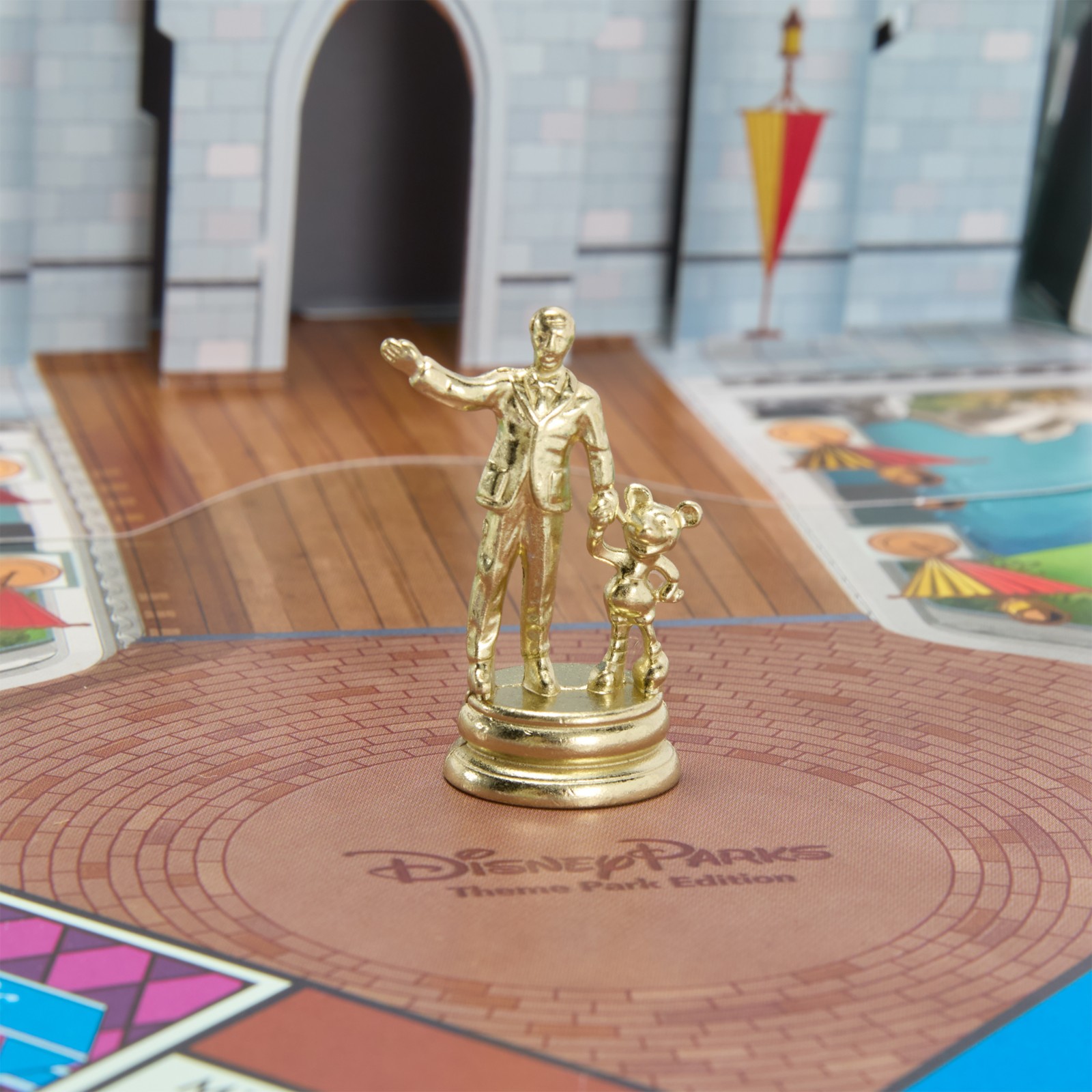 Gold Partners Statue token on the Disney Parks Monopoly board