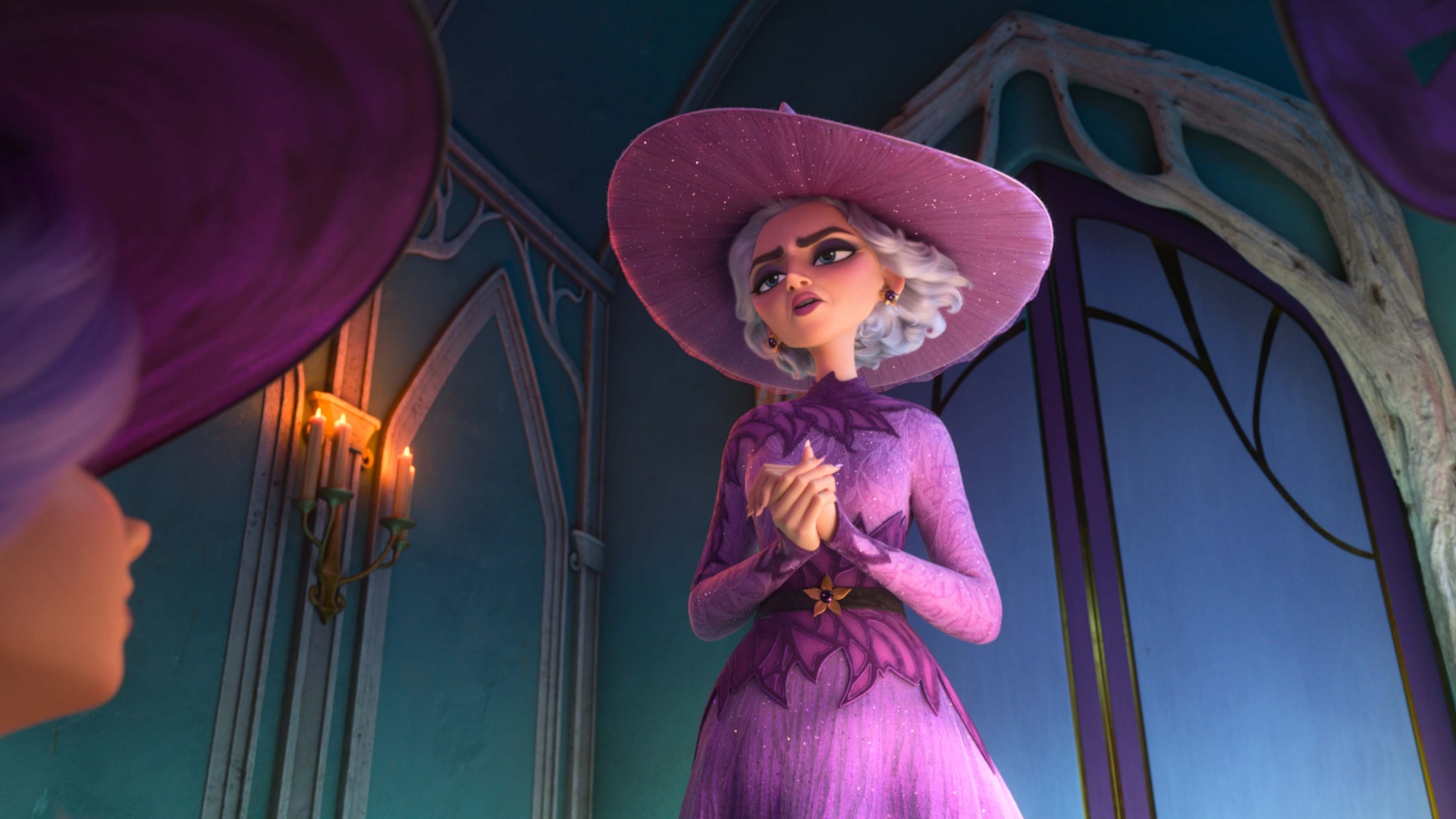 Queen Celeste looks down at another witch in Disney’s Hexed