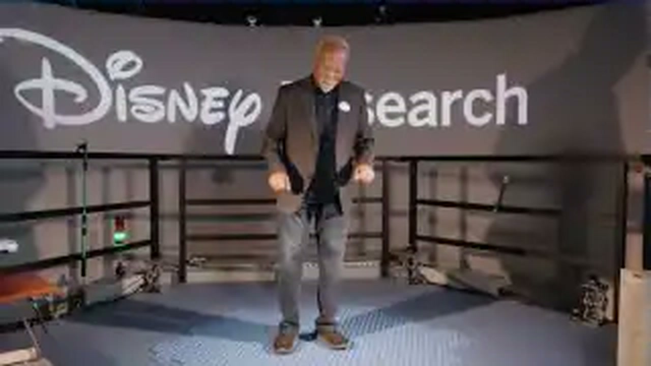 Disney Imagineer Lanny Smoot demonstrates the HoloTile floor at Disney Research