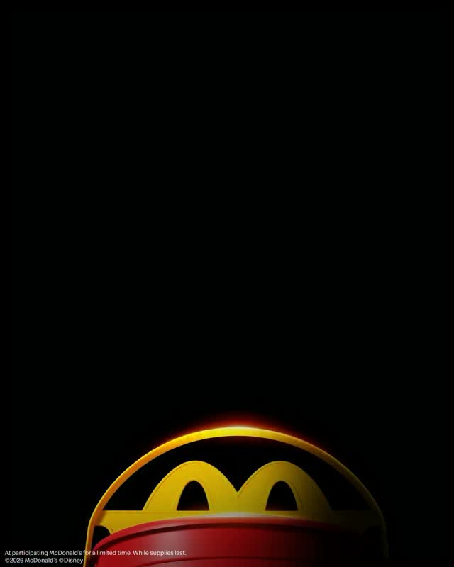 Five pairs of Disney Villains eyes above a McDonald’s Happy Meal pail